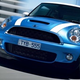 Illustration for article titled Dan Wheldon, UAW's fake Ford voting margin, and Mini Cooper S investigated over fires
